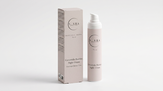 Ceramide barrier night cream in soft neutral packaging, featuring a minimalist pump bottle alongside its matching box, designed for overnight skin barrier care and hydration