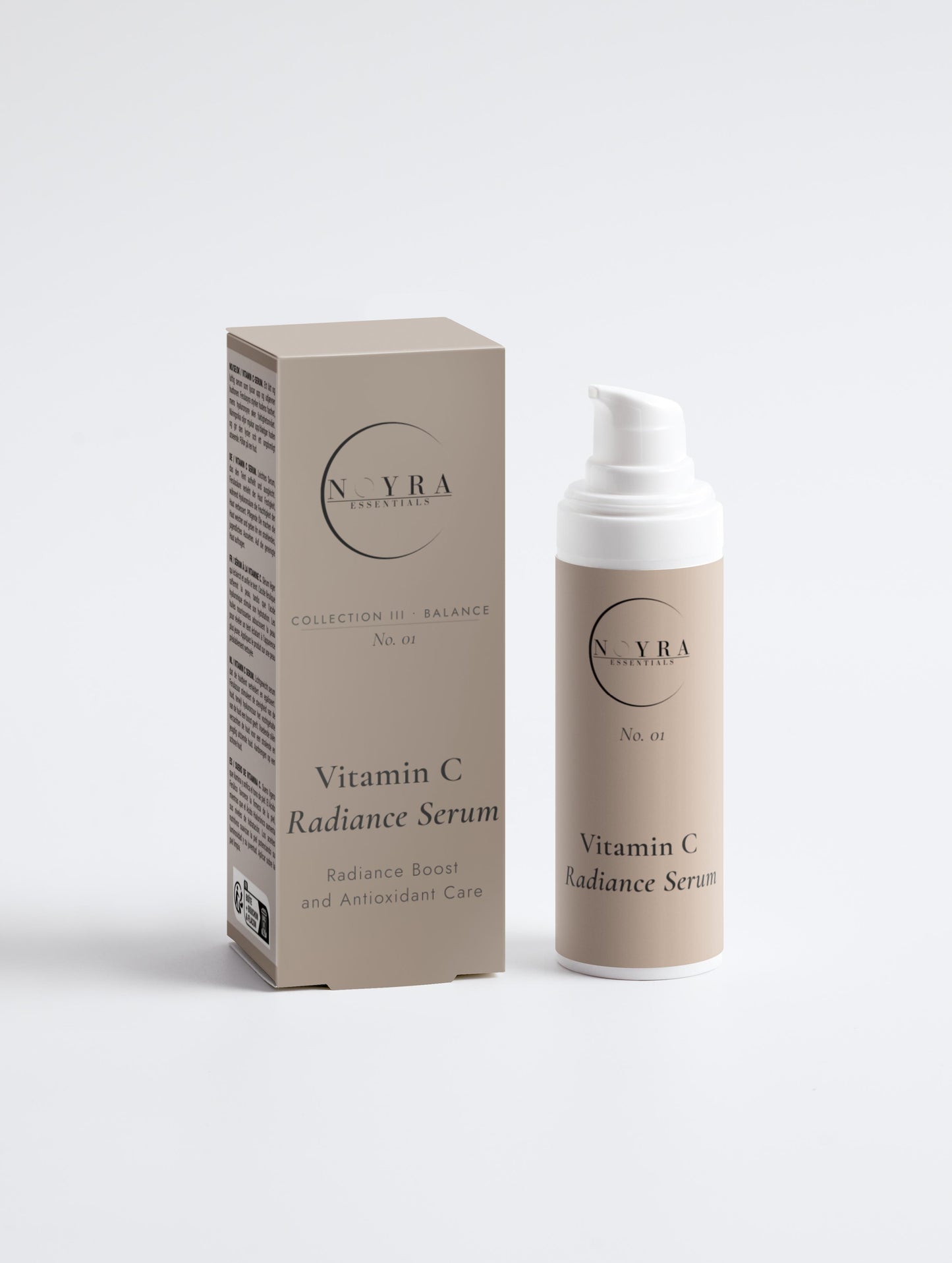 Vitamin C radiance serum in minimalist neutral packaging, featuring a pump bottle and matching box, designed to enhance skin radiance and provide antioxidant care