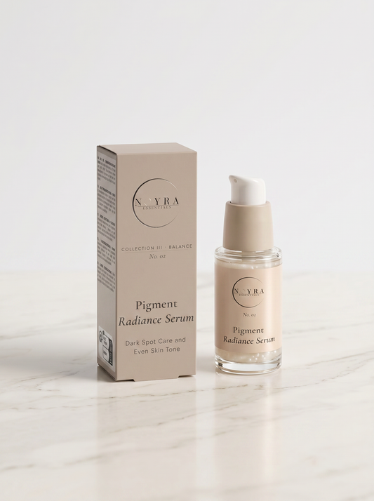 Pigment radiance serum in neutral-toned minimalist packaging, featuring a glass pump bottle and matching box, designed for dark spot care and improving even skin tone