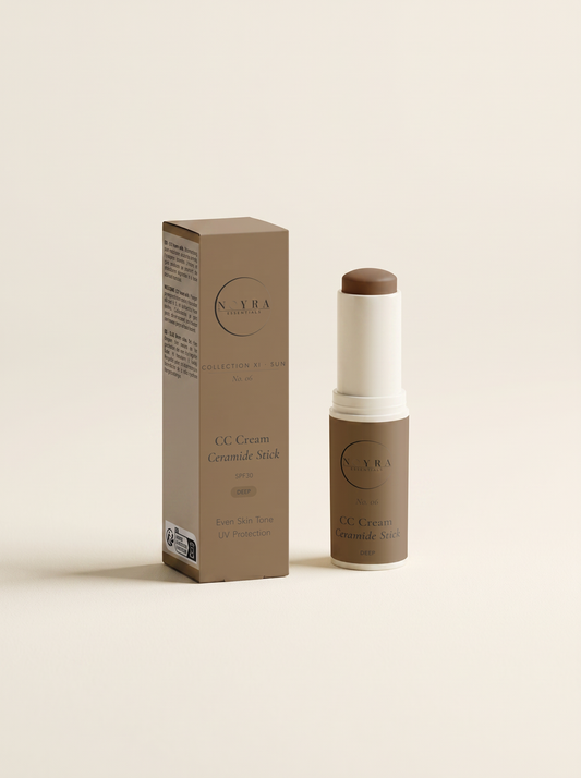 Luxury skincare campaign photography. Noyra CC Cream Ceramide Stick SPF30 Deep placed on warm natural stone surface under Mediterranean sunlight. Minimal luxury styling. Soft shadows. Elegant neutral architecture in background. Premium beauty editorial aesthetic. High-end cosmetic advertising photography. Accurate product colors and packaging. No text overlays. No branding artifacts.