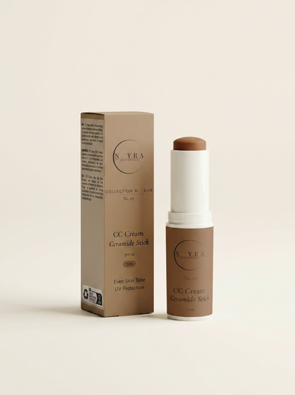 Noyra Essentials CC Cream Ceramide SPF30 Stick in Tan shade with packaging, designed to even skin tone and provide sun protection