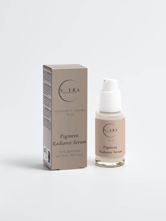 Pigment radiance serum in neutral-toned minimalist packaging, featuring a glass pump bottle and matching box, designed for dark spot care and improving even skin tone