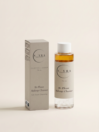 Bi-phase makeup cleanser in clear bottle with golden liquid and minimalist beige label, designed for gentle removal of makeup and impurities while maintaining skin balance