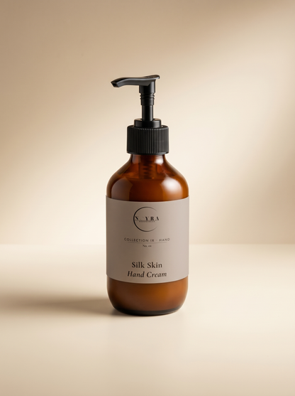 Nourishing hand cream with sandalwood scent in amber pump 