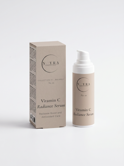 Vitamin C radiance serum in minimalist neutral packaging, featuring a pump bottle and matching box, designed to enhance skin radiance and provide antioxidant care
